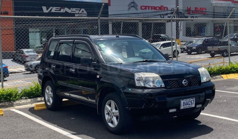 Excelente Nissan X-Trail 2011 lleno