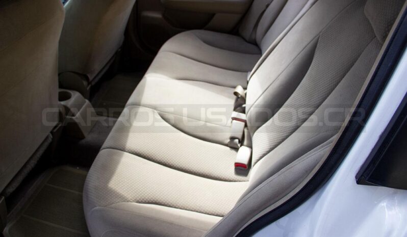 Impecable Nissan Tiida 2012 lleno